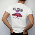 Man wearing a White tee, seen from the back: a boxy sedan under a car cover in a carport beneath a little rain cloud, with Not Today over It Might Rain, in deep red, purple and gunmetal.