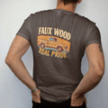 Man wearing a Espresso tee, seen from the back: a square-body pickup with wood-grain side panels against a wood-grain banner, under Faux Wood and over Real Pride.