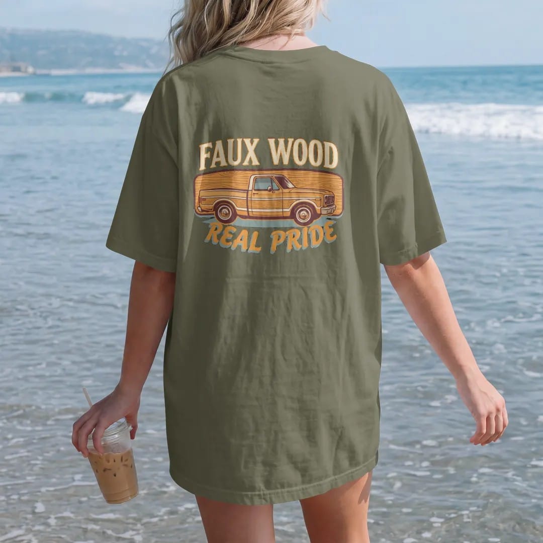 Woman on the beach in a Hemp tee, back view: a square-body pickup with wood-grain side panels against a wood-grain banner, under Faux Wood and over Real Pride.