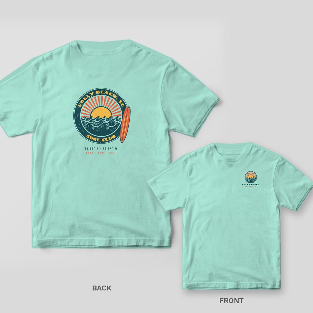 Chalky Mint Comfort Colors tee shown back and front: a retro Folly Beach Surf Club badge with sunburst, waves and longboard on the back and a small wave circle on the chest.