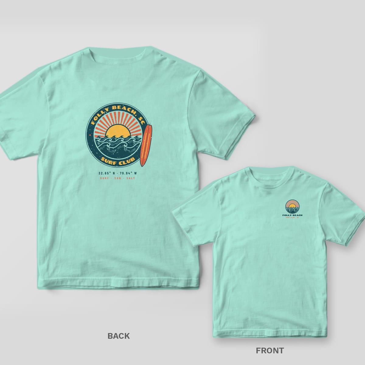 Chalky Mint Comfort Colors tee shown back and front: a retro Folly Beach Surf Club badge with sunburst, waves and longboard on the back and a small wave circle on the chest.