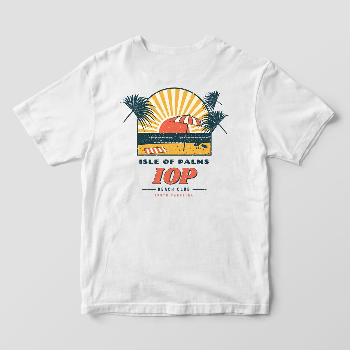 Back of a White Comfort Colors 1717 tee with a coral, mustard and deep teal sunburst beach scene above the words Isle of Palms, IOP, Beach Club.