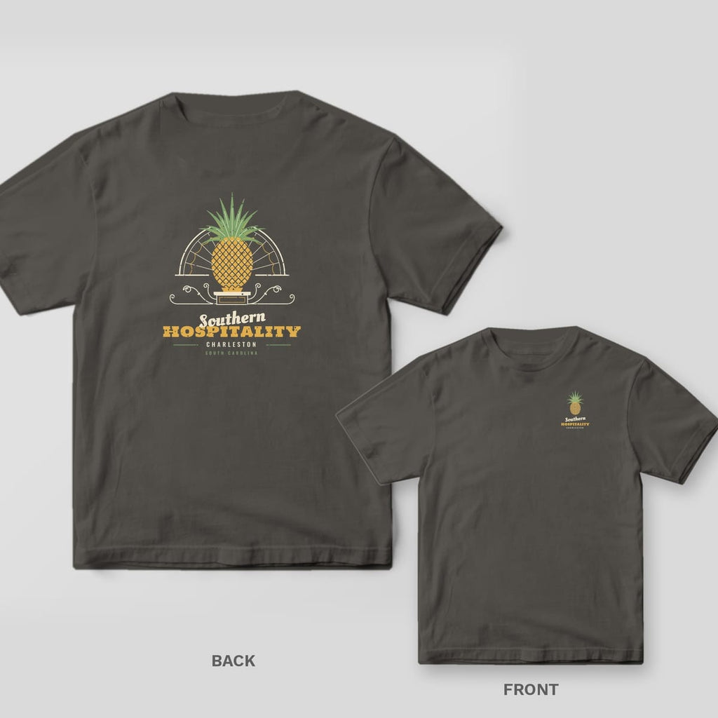 Pepper Comfort Colors tee shown back and front: a gold pineapple and fanlight doorway design on the back and a small pineapple on the chest.
