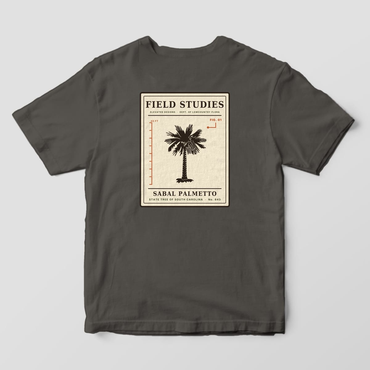 Back of a Pepper Comfort Colors 1717 tee with a cream specimen card reading FIELD STUDIES and SABAL PALMETTO, with a dark palmetto tree next to a rust 40 FT height ruler and a FIG. 01 callout.