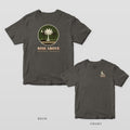 Pepper Comfort Colors tee shown back and front: a round starry palmetto scene over RISE ABOVE on the back and a crescent moon with RISE ABOVE on the left chest.