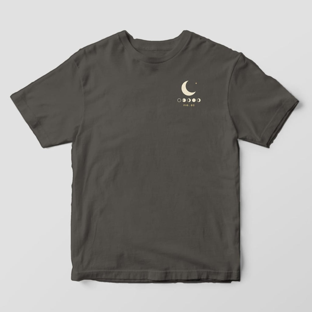 Front of a Pepper Comfort Colors 1717 tee with a small left-chest cream crescent moon and star above a row of five moon phases and FIG. 02.