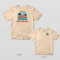 Ivory Comfort Colors tee shown back and front: an arched palmetto sunset scene over FOLLY BEACH on the back and a smaller beach arch on the left chest.