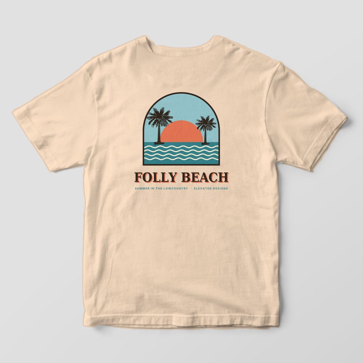 Back of an Ivory Comfort Colors 1717 tee with an arched beach scene of two palmettos, a coral sun and teal ocean waves under a light blue sky, above FOLLY BEACH and SUMMER IN THE LOWCOUNTRY · ELEVATED DESIGNS.
