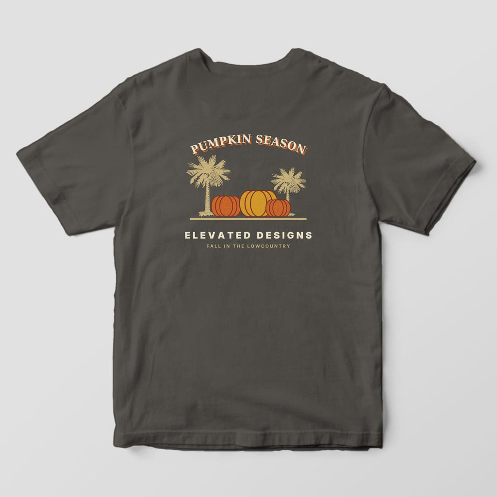 Back of a Pepper Comfort Colors 1717 tee with PUMPKIN SEASON arched over three orange and gold pumpkins between two tan palmetto trees, above ELEVATED DESIGNS and FALL IN THE LOWCOUNTRY.