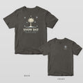 Pepper Comfort Colors tee shown back and front: a palmetto under snowflakes over SNOW DAY on the back and a single snowflake over SNOW DAY on the left chest.
