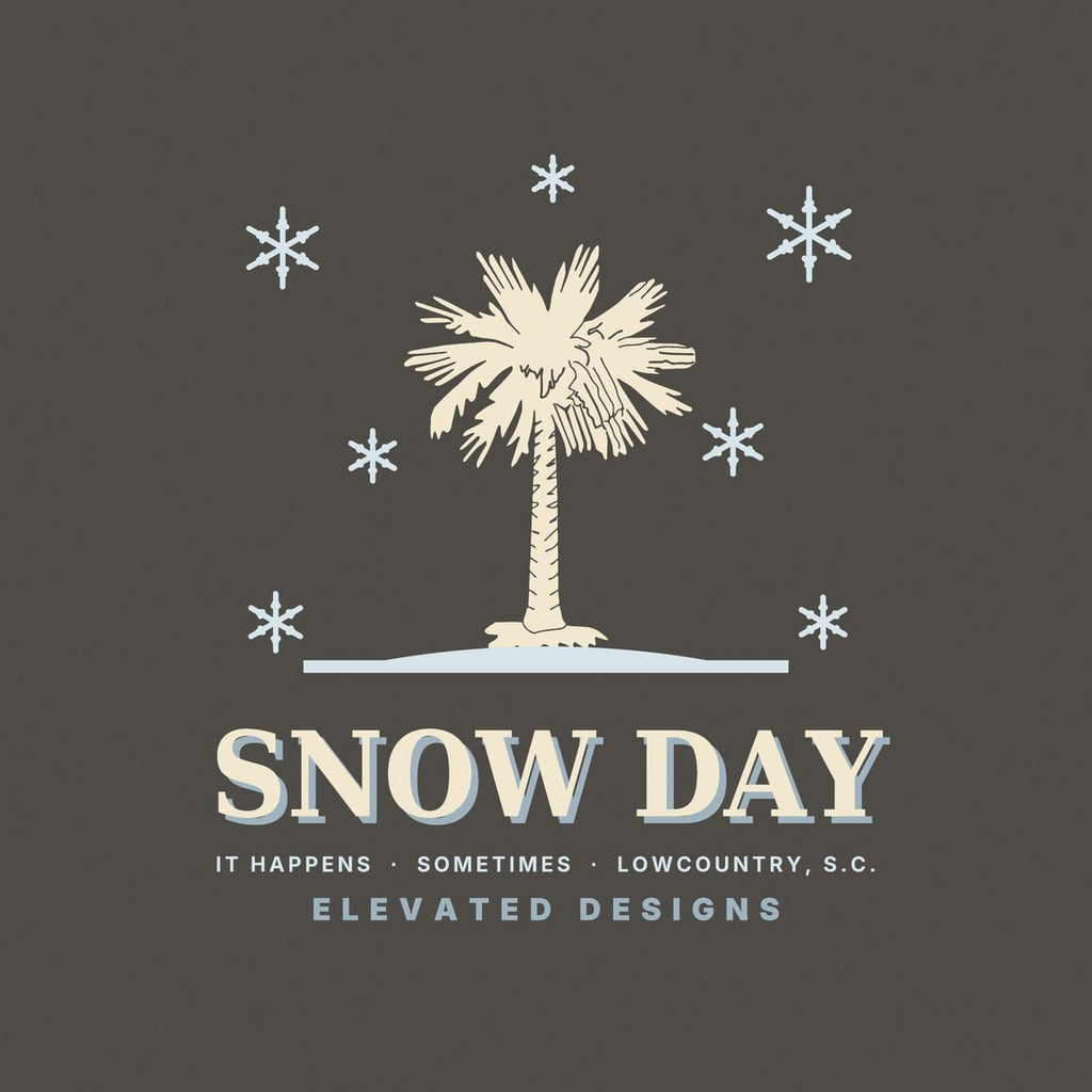 Close-up of the Snow Day print: a sketchy cream palmetto on a pale blue ground line with pale blue snowflakes and cream lettering with a blue shadow.