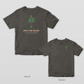 Pepper Comfort Colors tee shown back and front: a palmetto wrapped in Christmas lights over DECK THE PALMS on the back and a smaller lit palmetto on the left chest.