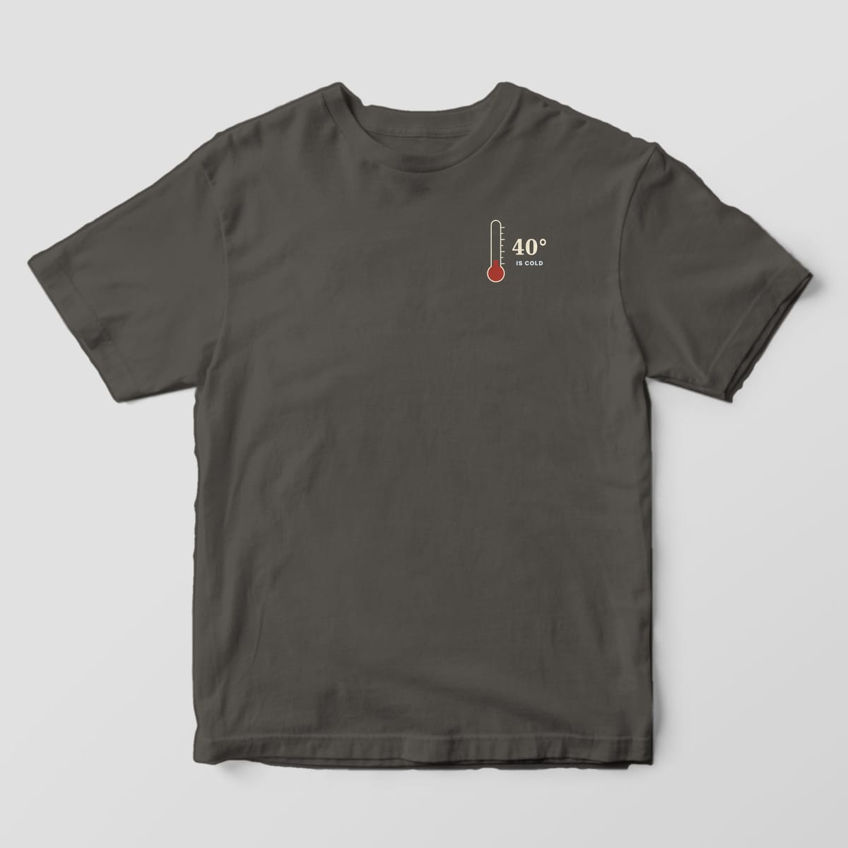 Front of a Pepper Comfort Colors 1717 tee with a small left-chest thermometer with a red bulb next to the words 40° IS COLD.