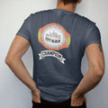 Man wearing a Midnight tee, seen from the back: a heavyweight championship belt with a skyline plate reading City Block over a Champion banner, in yellow, bone white, orange and green.