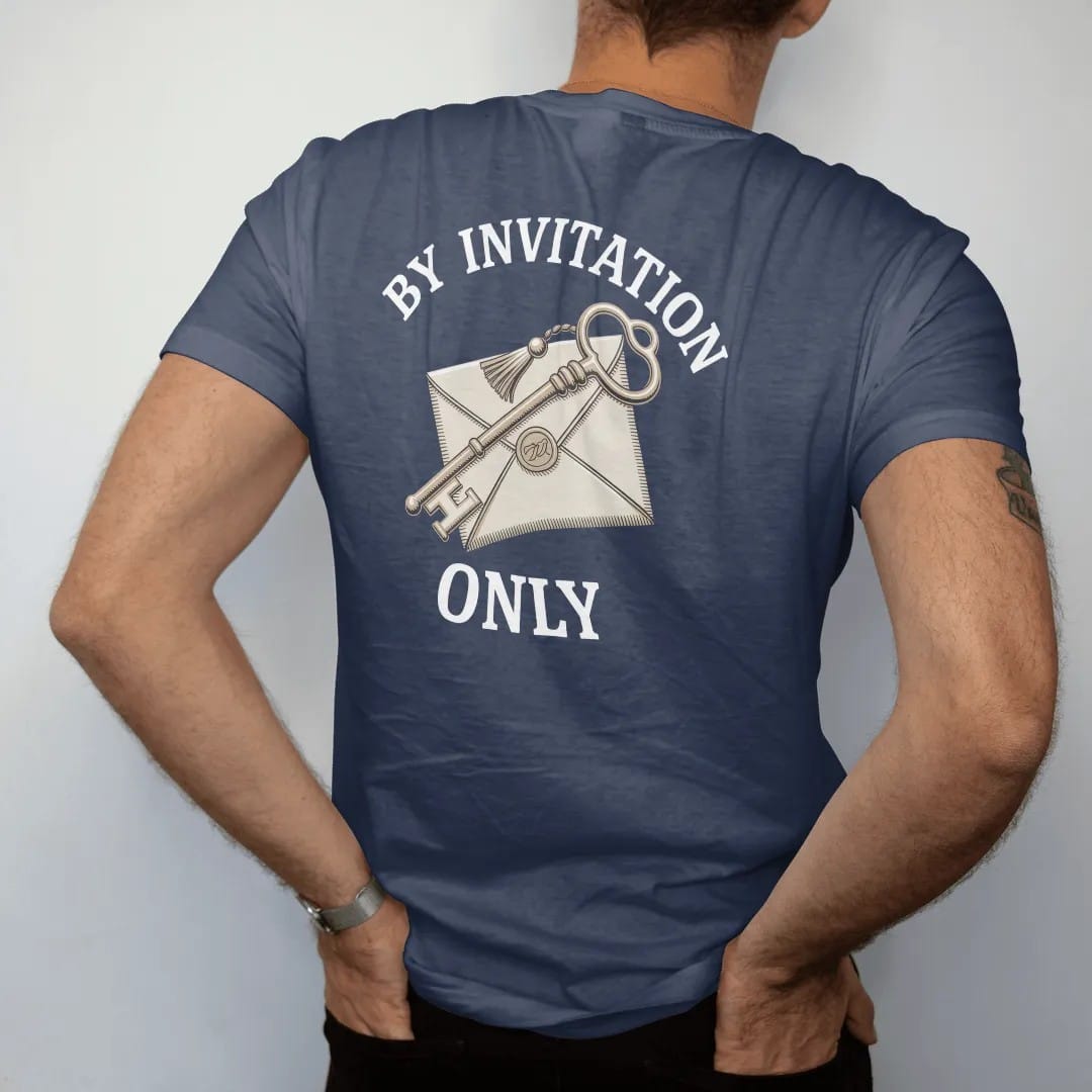Man wearing a Navy tee, seen from the back: an ornate tasseled key over a wax-sealed envelope under By Invitation and Only, as a fine engraving in cream and champagne gold.