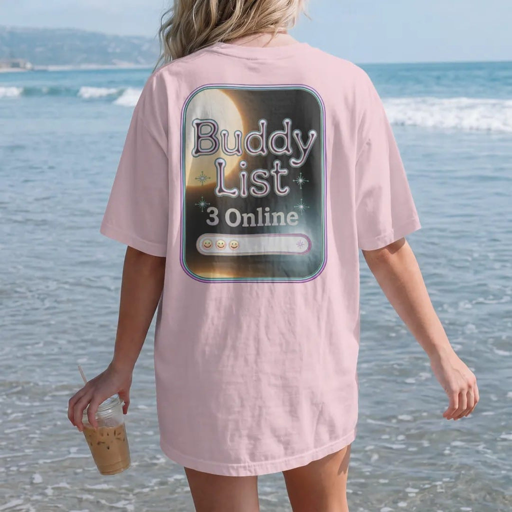 Woman on the beach in a Blossom tee, back view: a beveled buddy-list window with three smiling avatar icons, with "BUDDY LIST" and "3 ONLINE" in liquid-chrome bubble letters and small pixel type, printed in glossy gunmetal chrome, cobalt, hot…