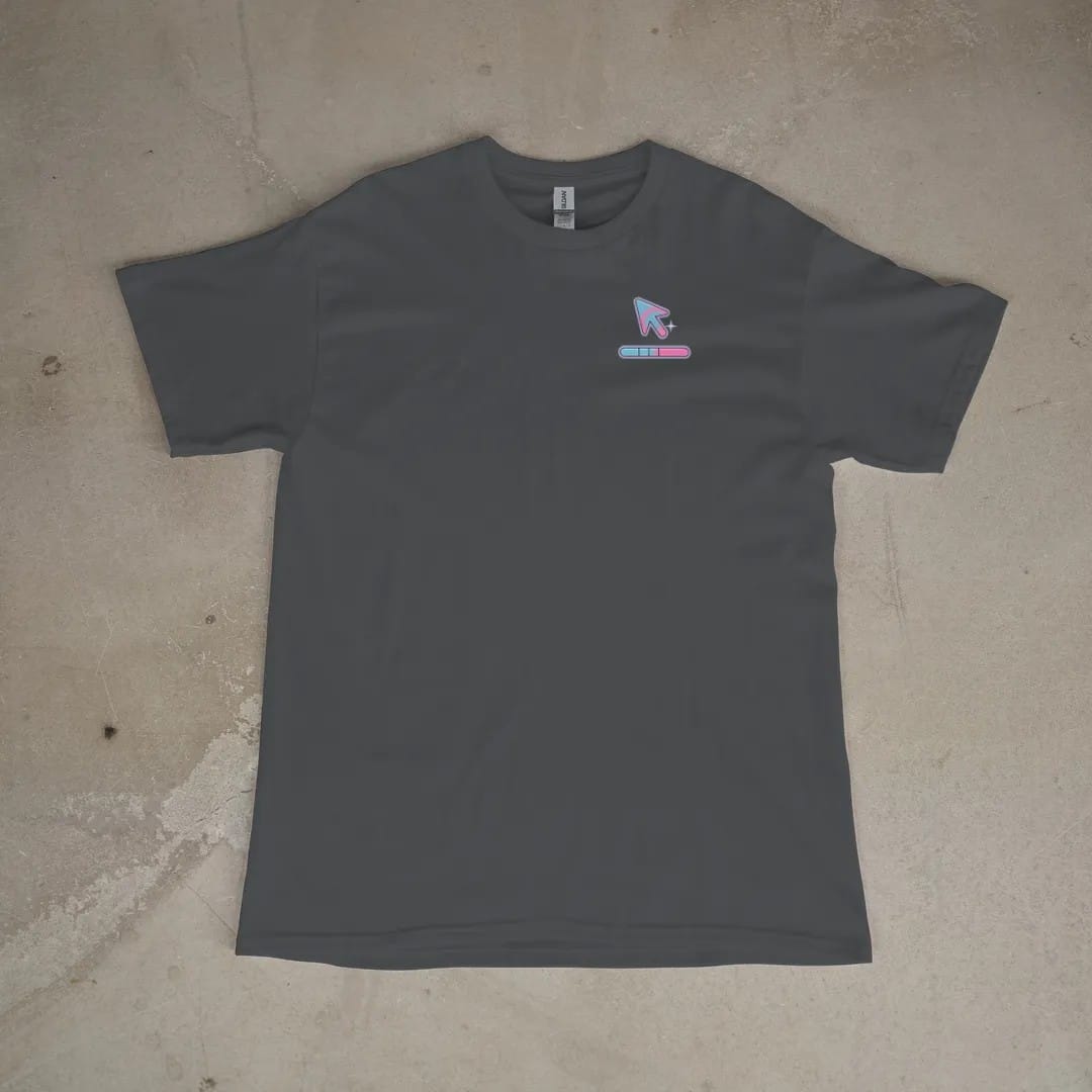 Front of a Graphite tee laid flat, with the small Dial-Up Days logo on the left chest.