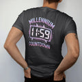 Man wearing a Black tee, seen from the back: a glowing digital clock at 11:59 with confetti and party hats, with "MILLENNIUM" and "COUNTDOWN" in liquid-chrome bubble letters and small pixel type, printed in glossy chrome silver, baby blue,…