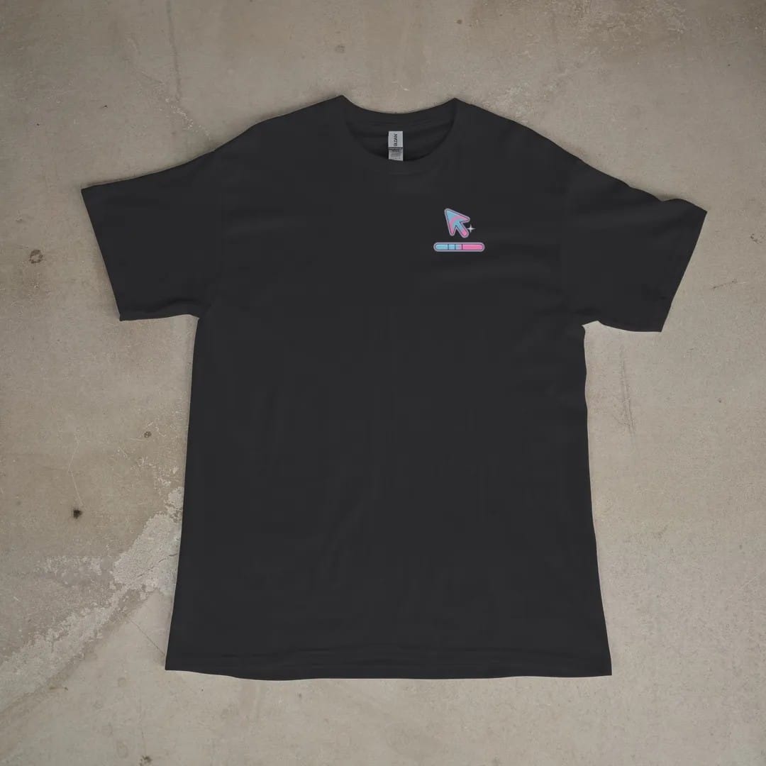 Front of a Black tee laid flat, with the small Dial-Up Days logo on the left chest.