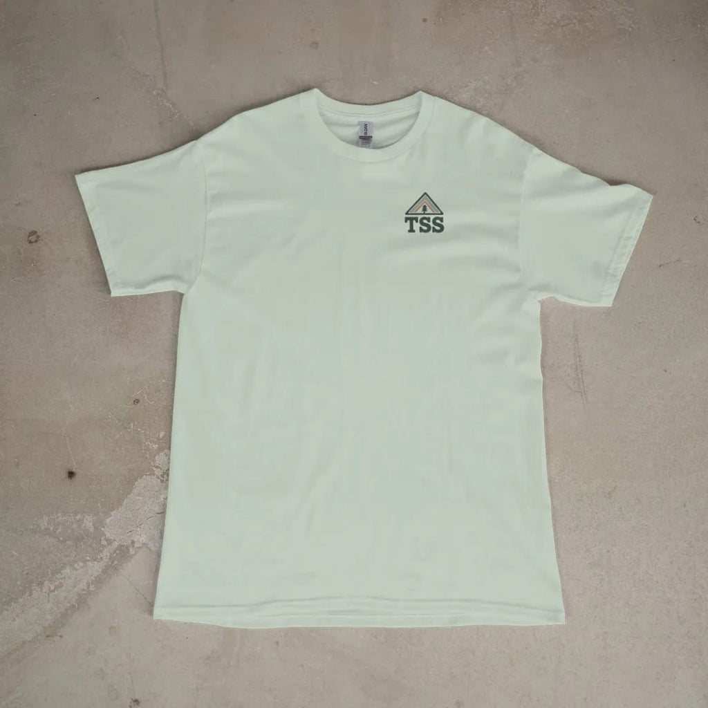 Front of a Bay tee laid flat, with the small Trailhead Standard logo on the left chest.