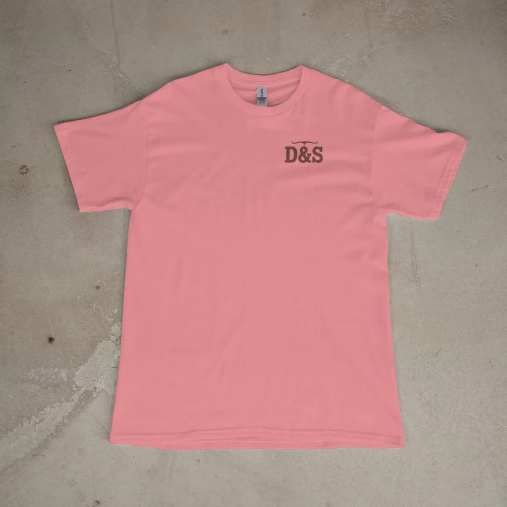 Front of a Watermelon tee laid flat, with the small Dust & Spur logo on the left chest.