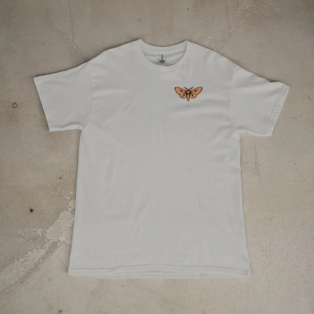 Front of a Granite tee laid flat, with the small Nocturne logo on the left chest.