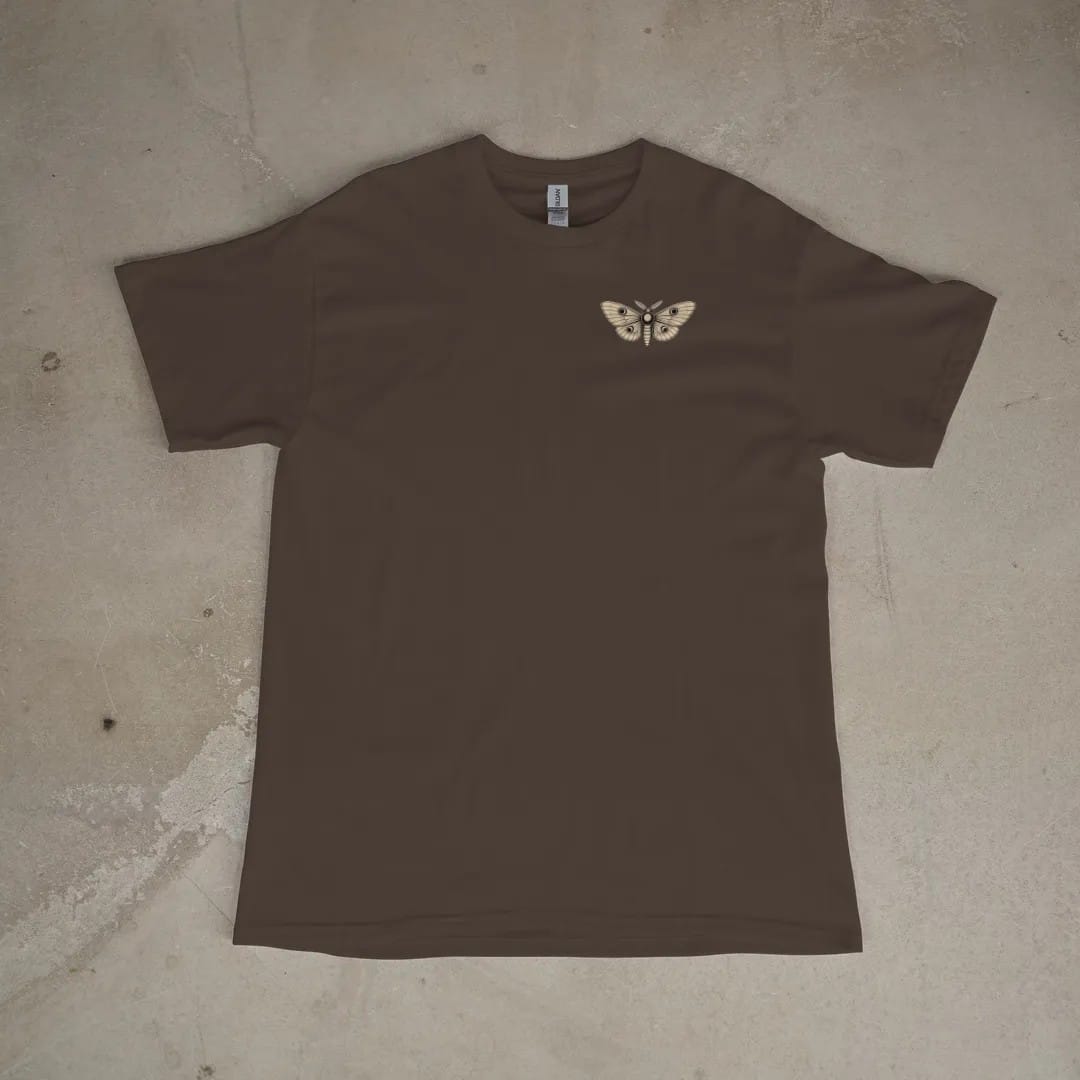 Front of a Espresso tee laid flat, with the small Nocturne logo on the left chest.