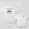 White Comfort Colors tee with a back print of a pink and navy pontoon boat under a yellow sun reading Boat Day Babes, Charleston Harbor, plus a chest print inset.