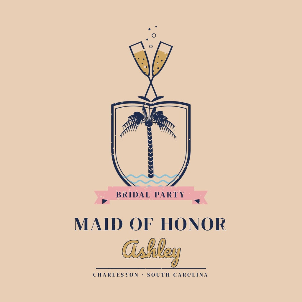 Close-up of the crest artwork: crossed flutes with bubbles, palmetto tree, waves, pink ribbon and lettering