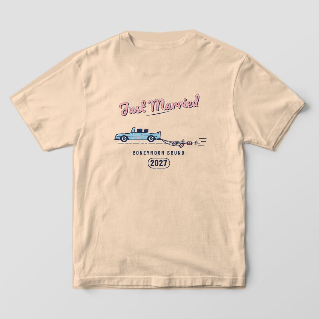 Back of an Ivory Comfort Colors tee: Just Married script over a vintage getaway car dragging tin cans and shells, HONEYMOON BOUND 2027
