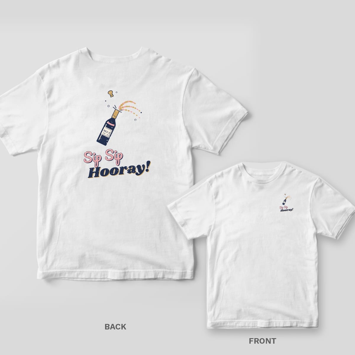 White Comfort Colors tee back and front with a navy champagne bottle popping its cork and pink and navy Sip Sip Hooray lettering