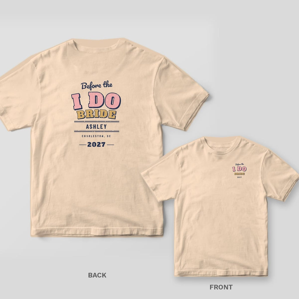 Ivory Comfort Colors tee back and front with pink varsity I DO, gold BRIDE lettering, the name ASHLEY and 2027